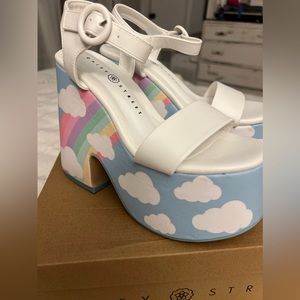 Cute platforms with rainbows and clouds